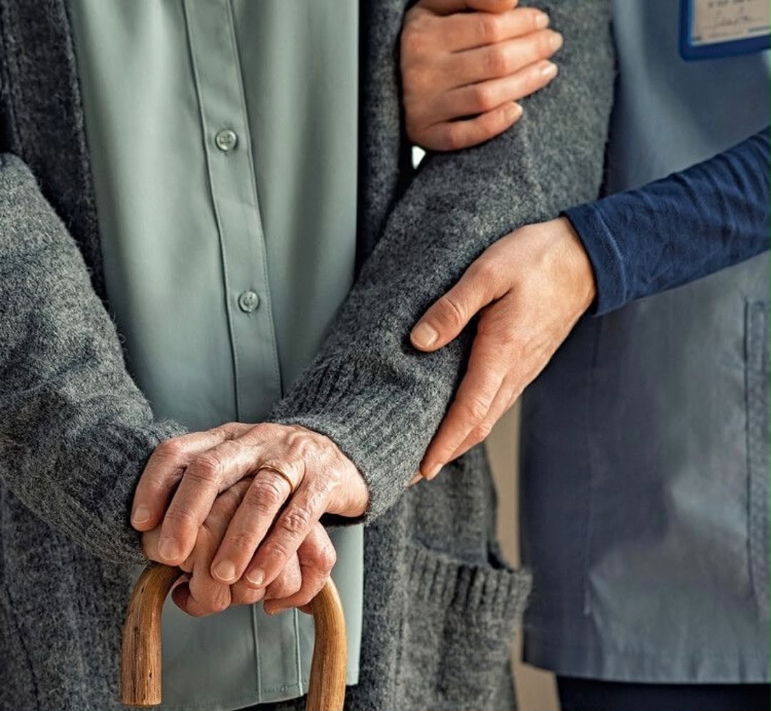 Home nurse caring for a patient
