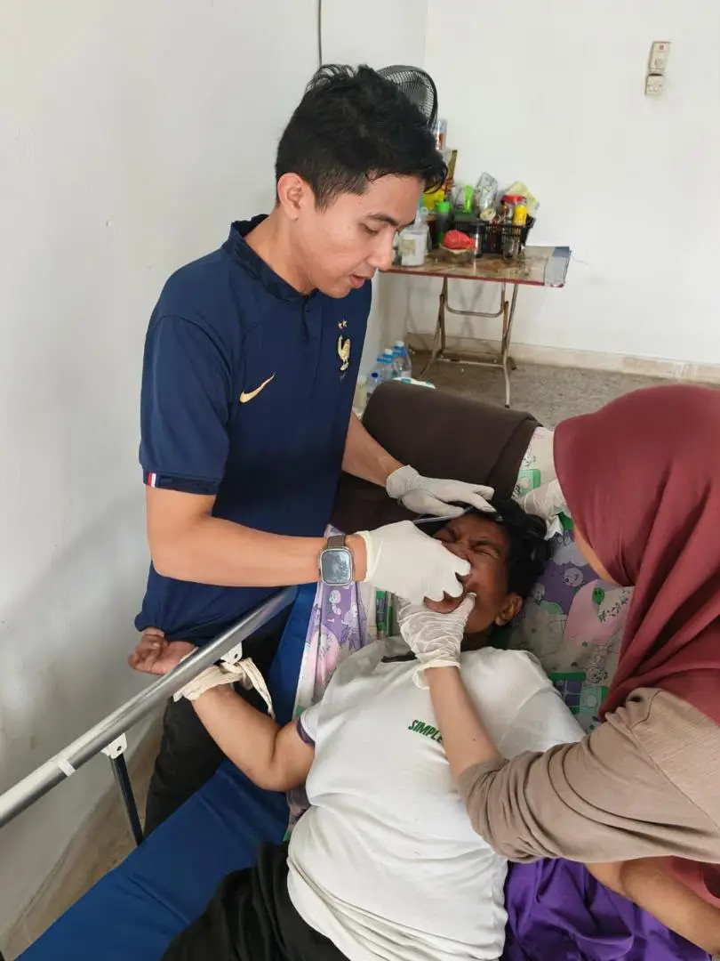 Nurse assisting patient with wheelchair